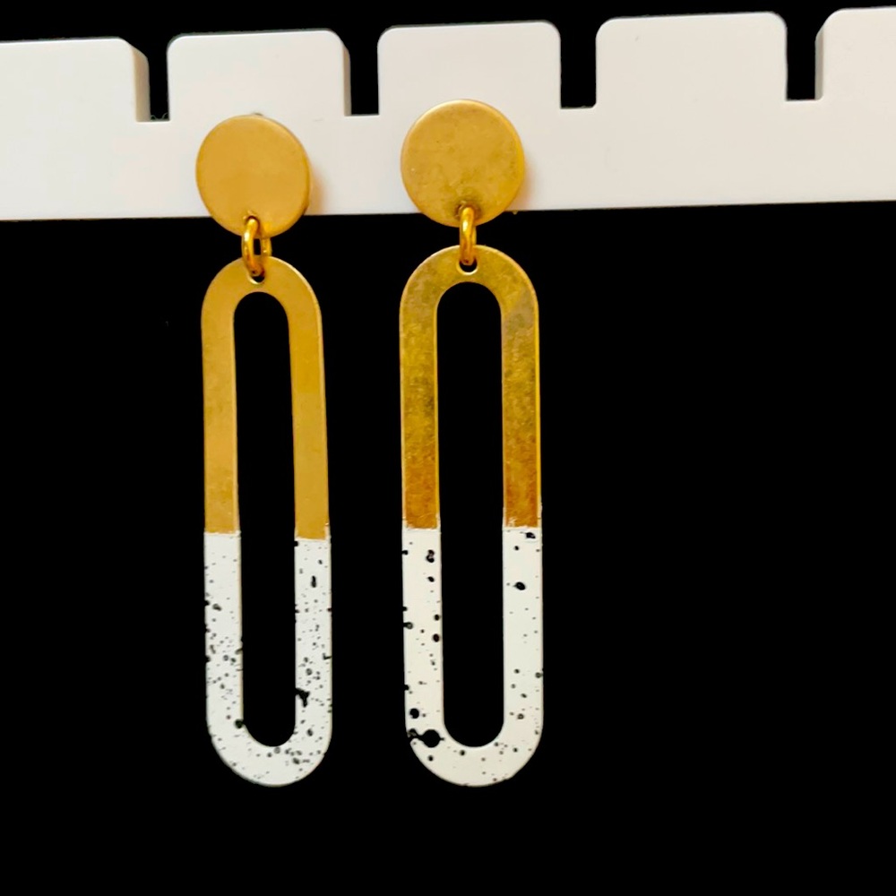 Gold earrings with painted white + black specks ~2 inches